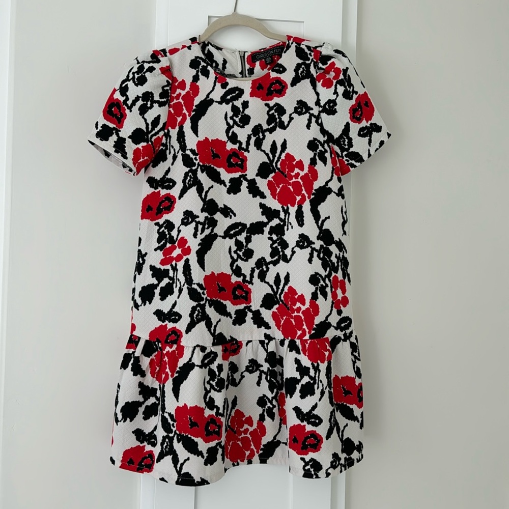 Drop waist dress with zipper back. Fits like a small
